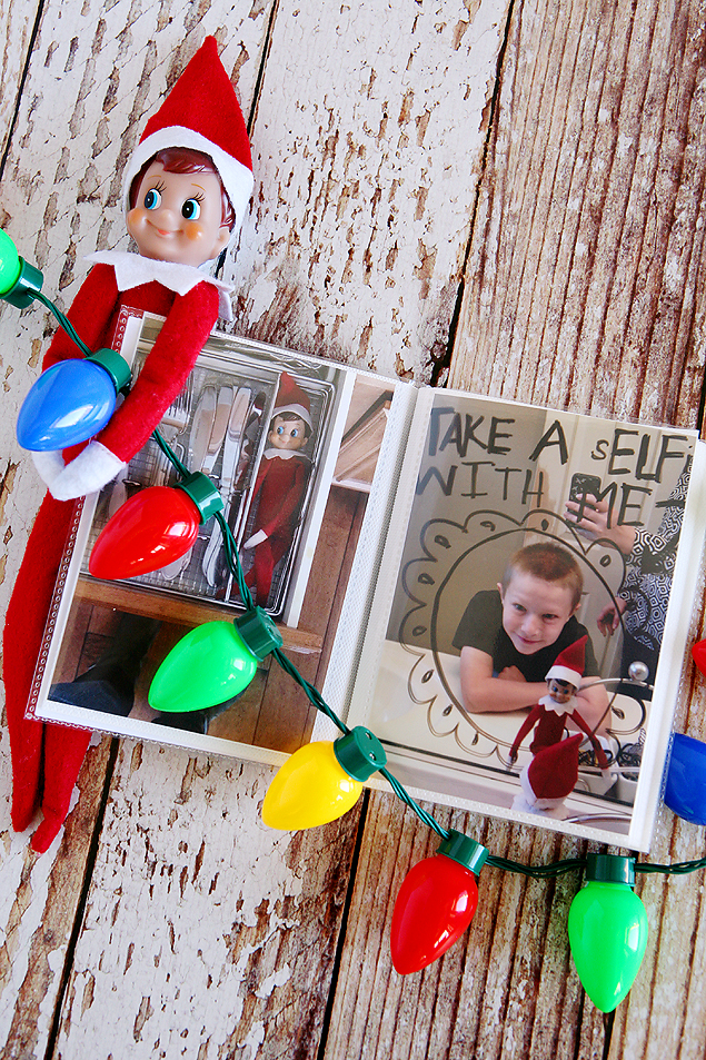 DIY Elf on the Shelf Photo Album. Costs about 2 bucks to make. Too fun! 