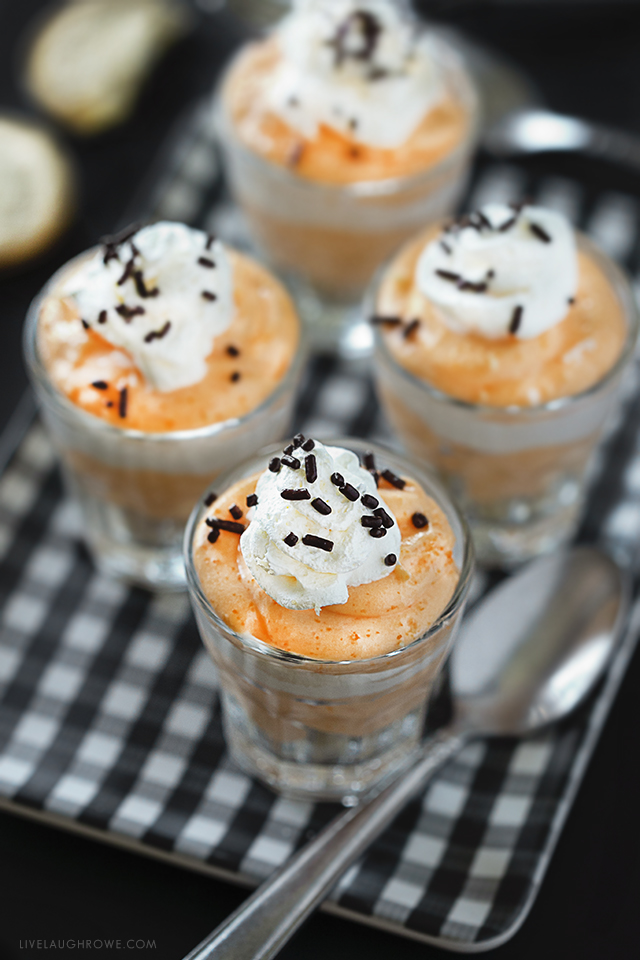 These colorful creamsicle pudding shots are perfect for Halloween, especially with a few chocolate sprinkles on top. Recipe at livelaughrowe.com