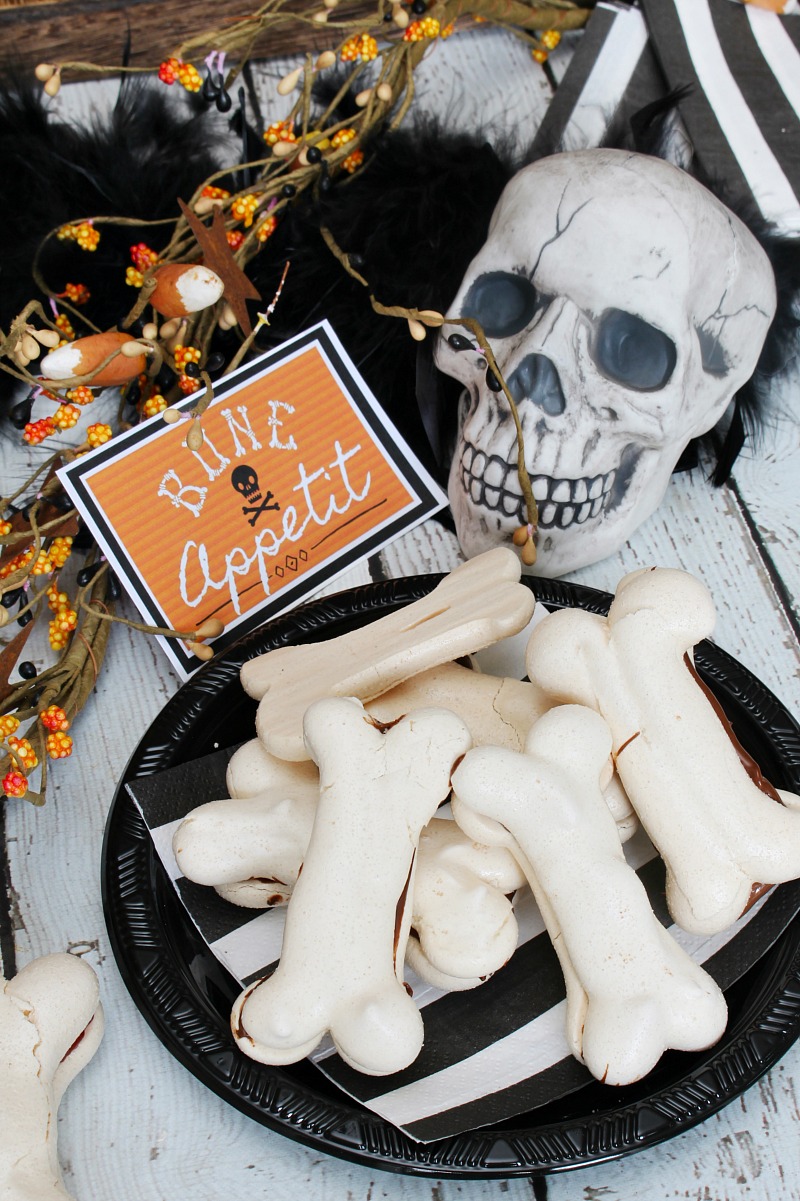 Meringue bones Halloween treats filled with Jam and Nutella