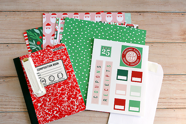 Christmas Planner supplies. Composition notebook, Christmas papers, printables and envelopes. 